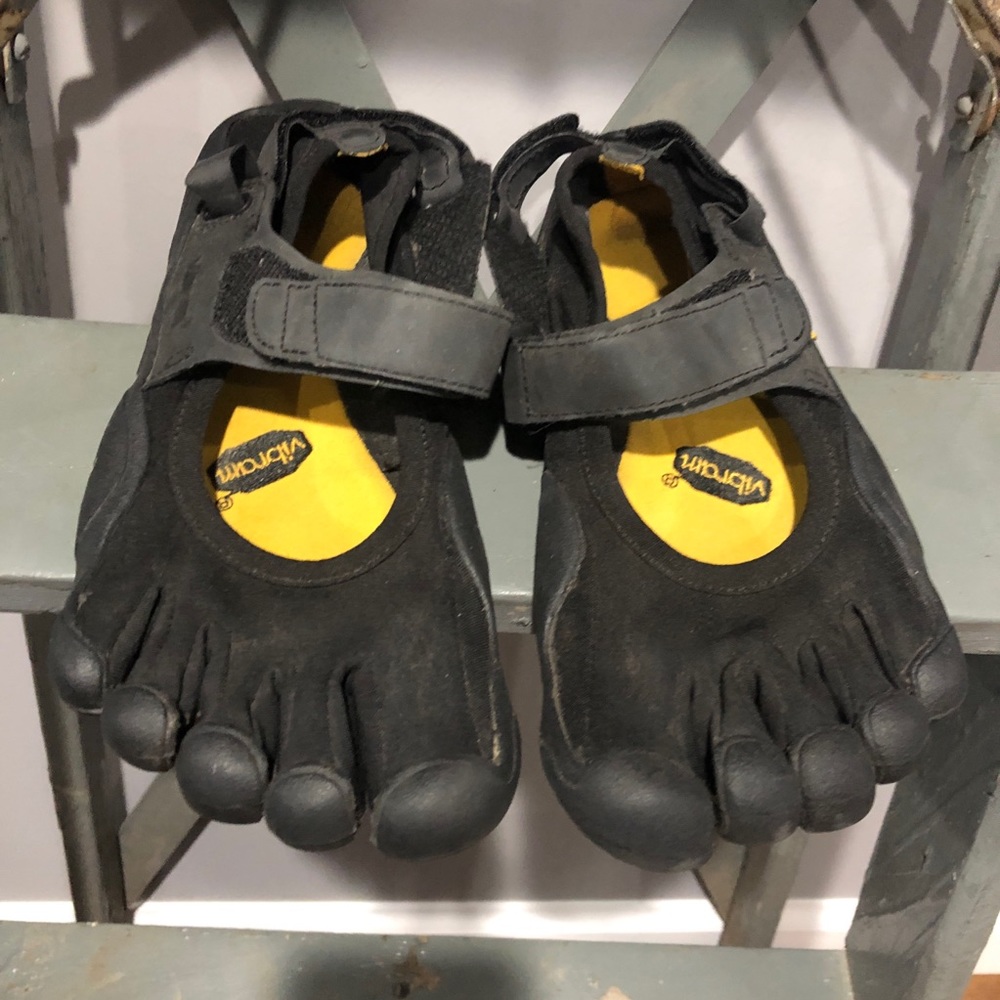Black Vibram fivefinger shoes